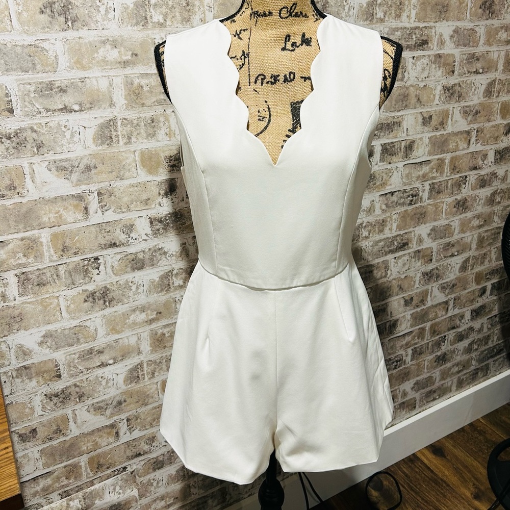 White one piece romper.